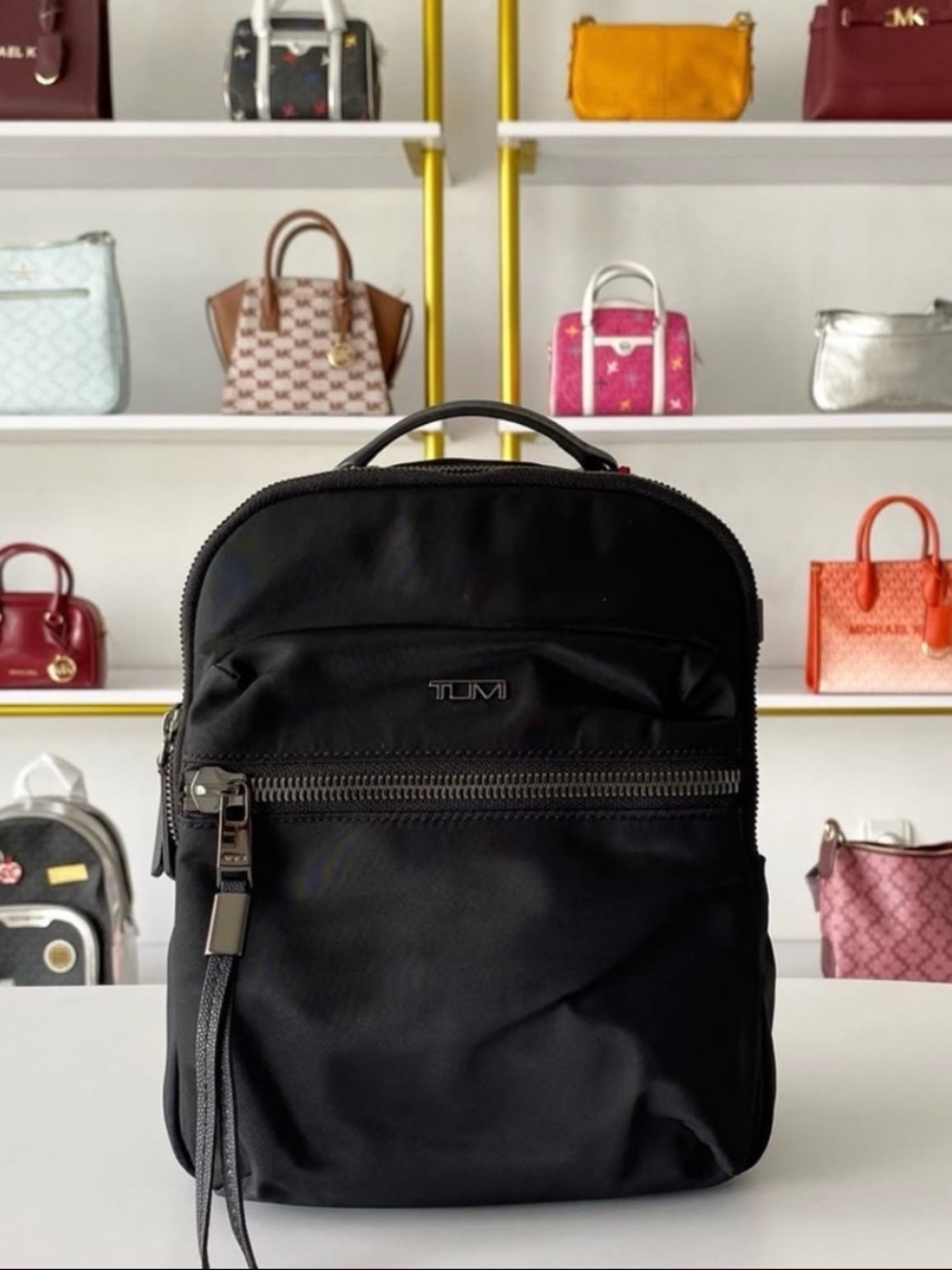 Tumi Black Nylon Compact Backpack with Front Zip Pocket